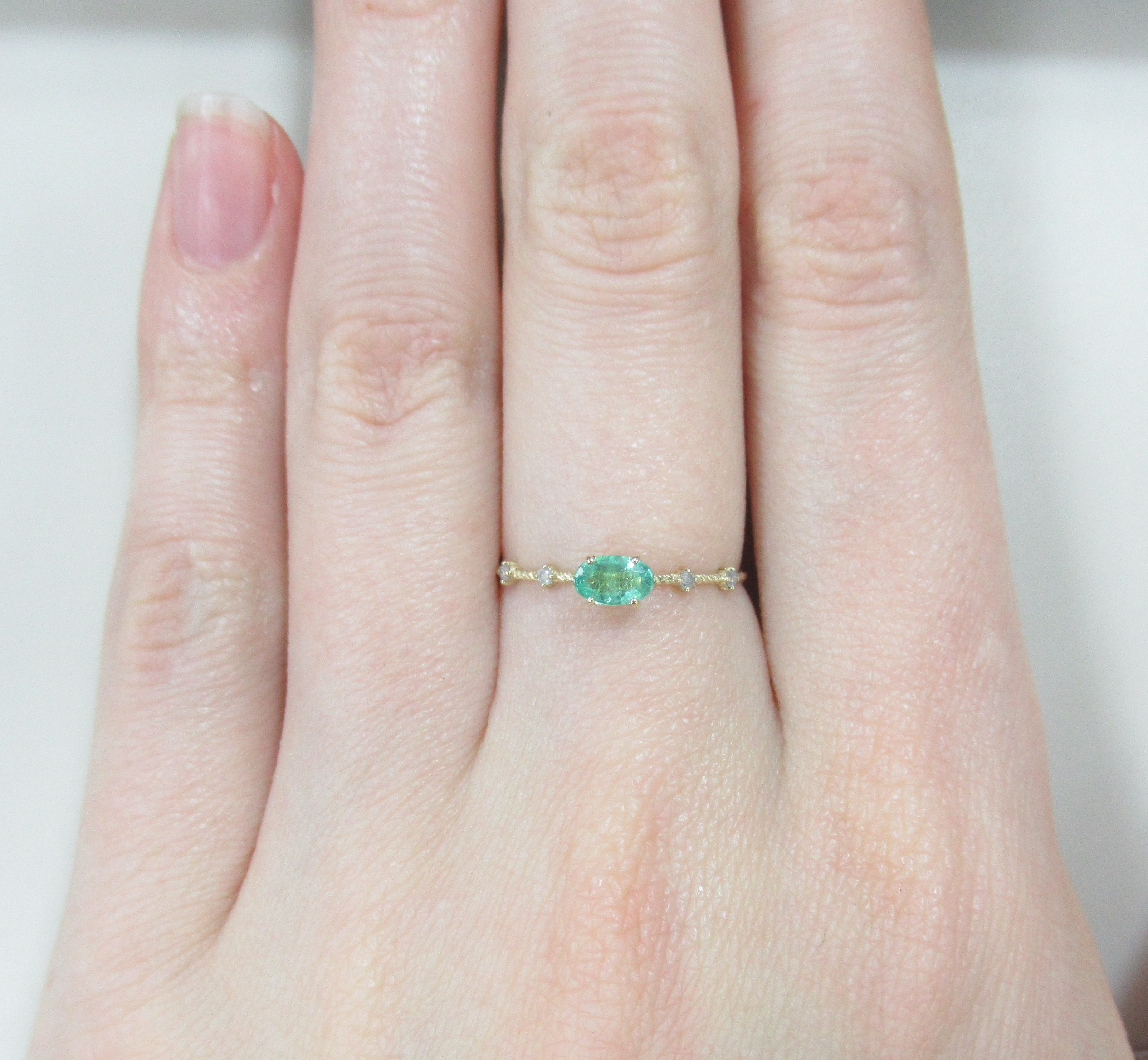 Кольцо из желтого золота с изумрудом